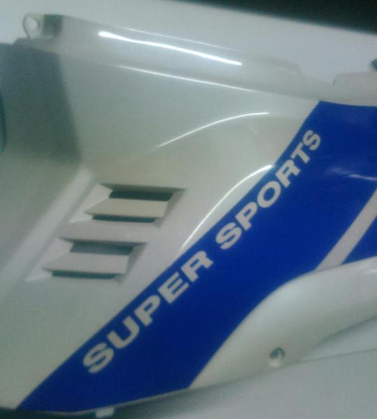 Fianchetto sinistro bianco-viola originale per MBK CT